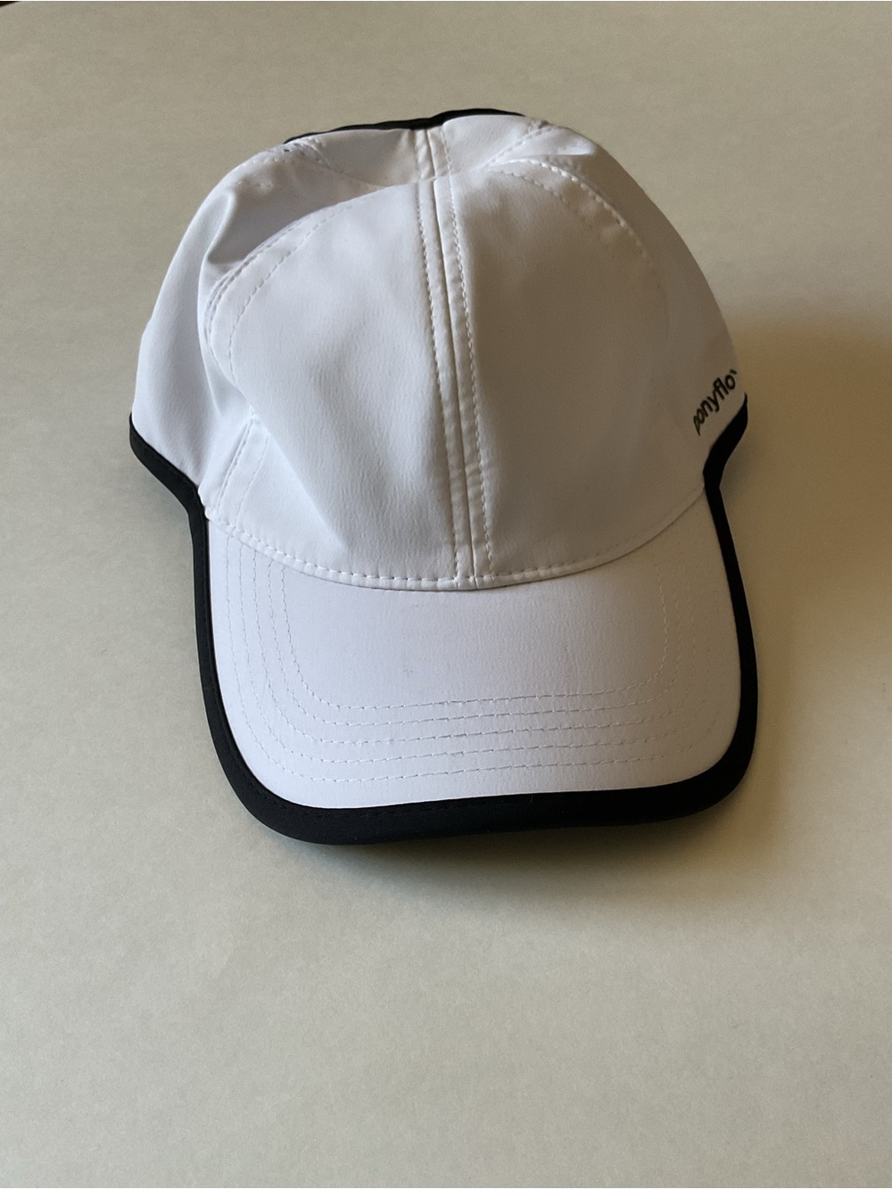PONYFLO WOMENS ADJUSTABLE BASEBALL CAP WHITE WITH BLACK TRIM OS NWT